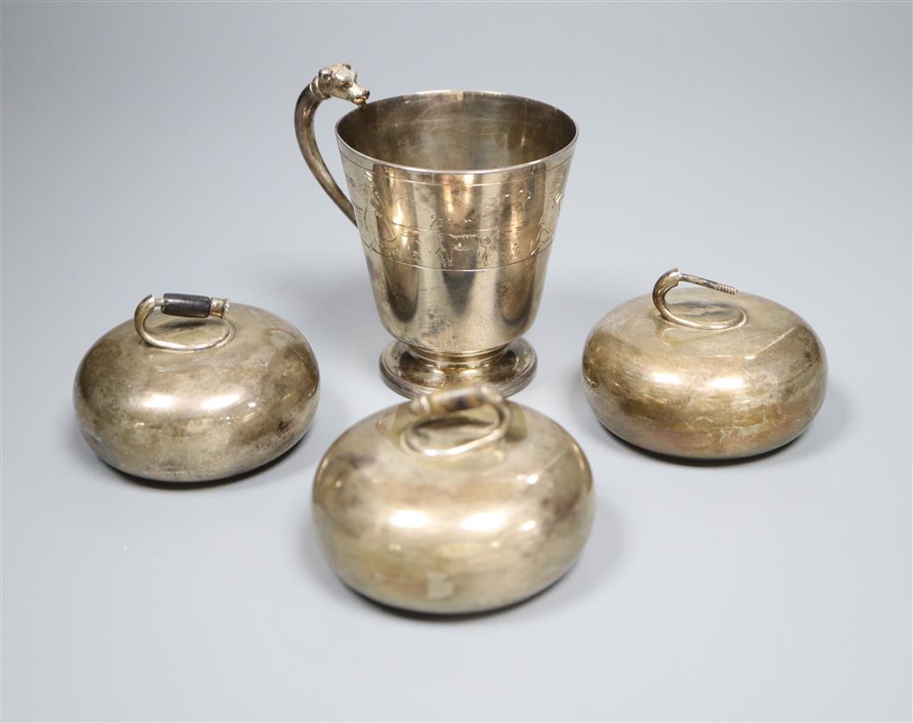 A 1930s Art Deco silver christening mug with dogs head handle and engraved with Little Bo Peep & 3 curling stones.